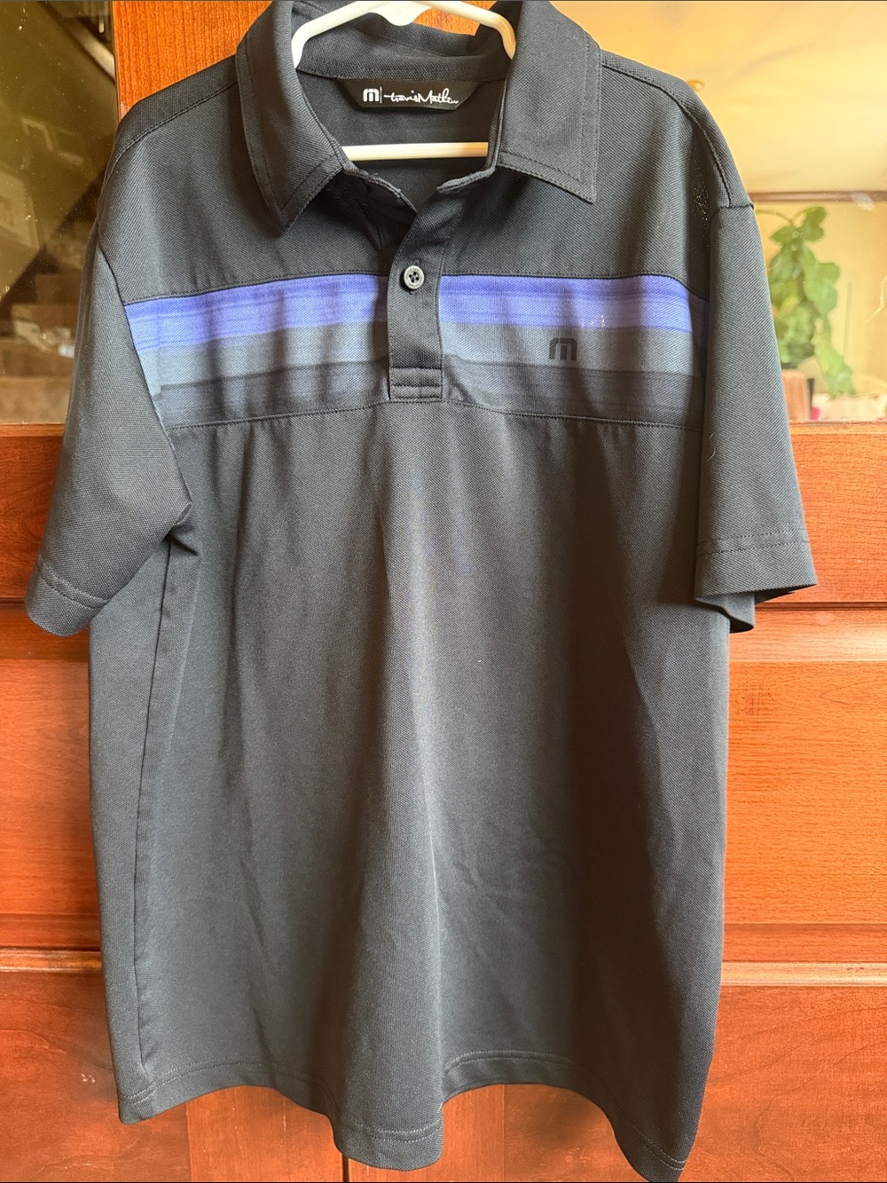 Travis Mathew Black Polo with Blue and Gray Chest Stripes